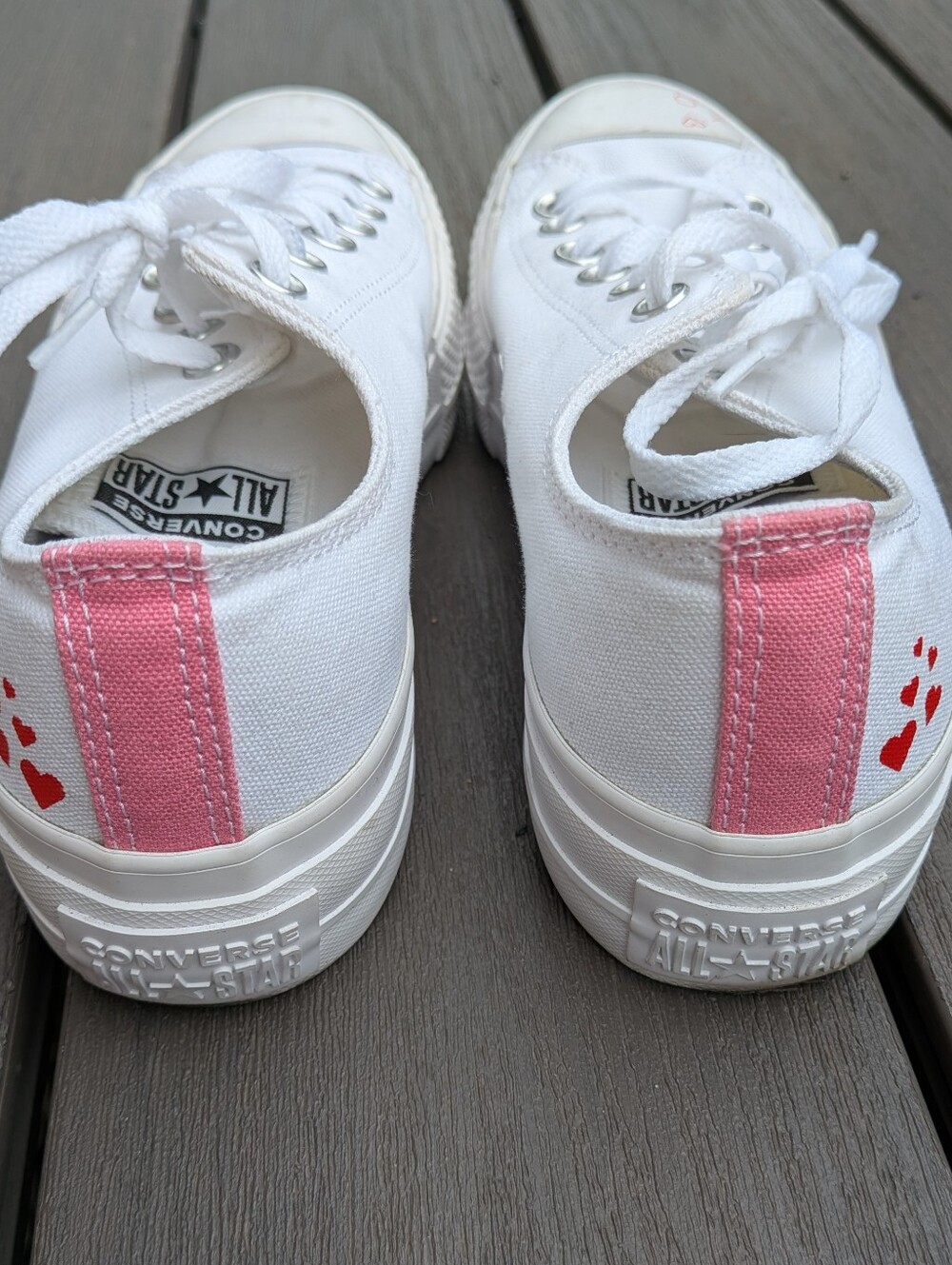 Converse White Canvas Sneakers with Pink Heel Strip and Red Heart Motif